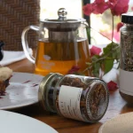 SHADE_Botanicals_-_Loose_Leaf_Tea_Blends_-_Drinking_Lifetyle_-_70_mL_and_330_mL_Recycled_Glass_Jar_-_Golden_Rosella_and_Moringa_Melody_Variant